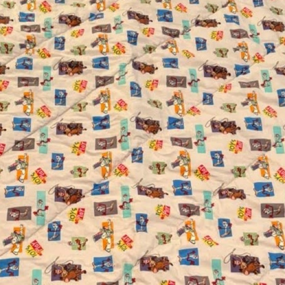 Colorful Patchwork Quilt with Toy Story Design
